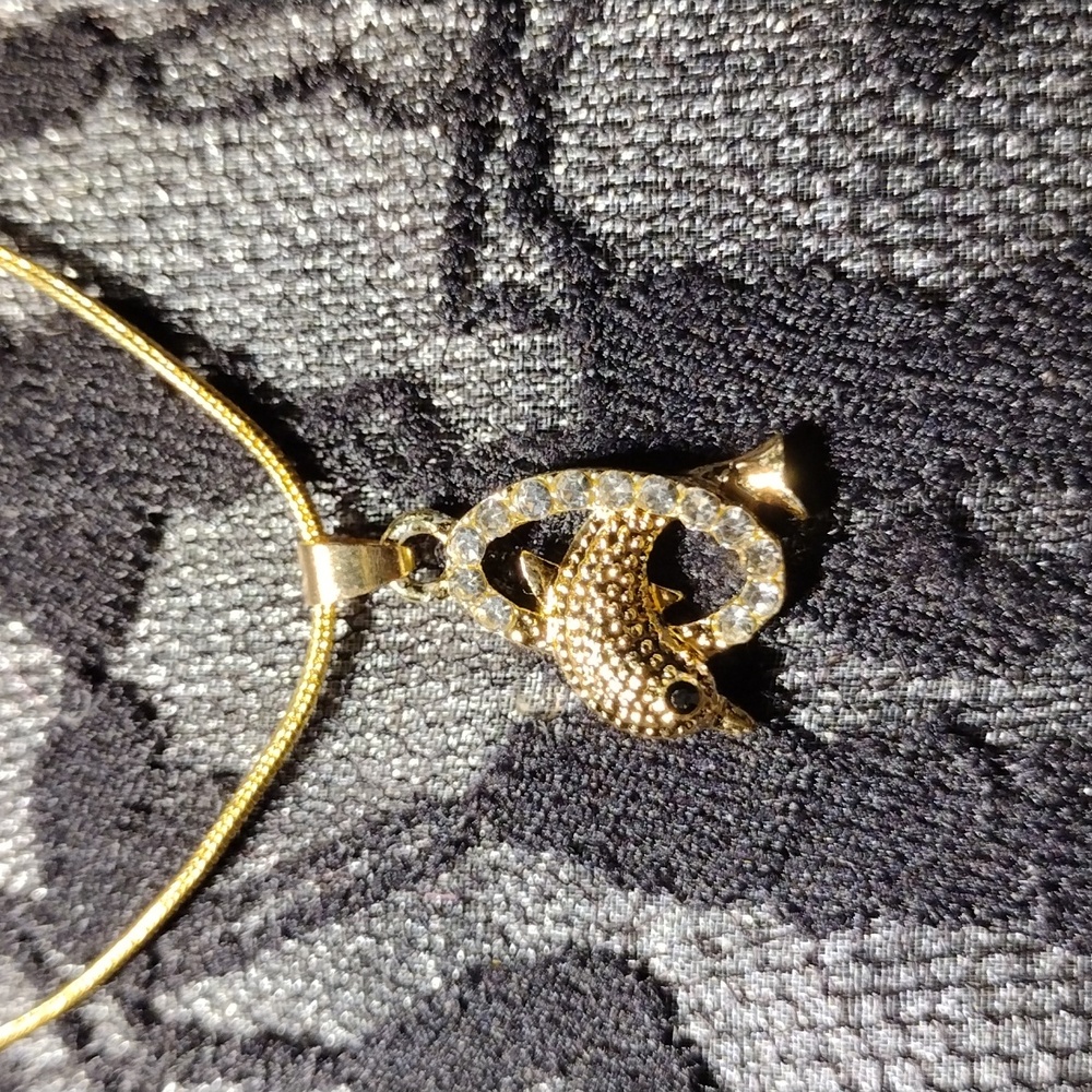 18" Gold plated w/rhinestones dolphin necklace & pendant.